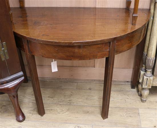 A George III D shaped side table W.106cm